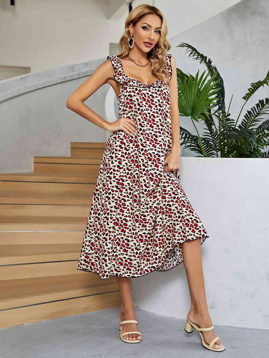 Vestido midi sin mangas con volantes estampado