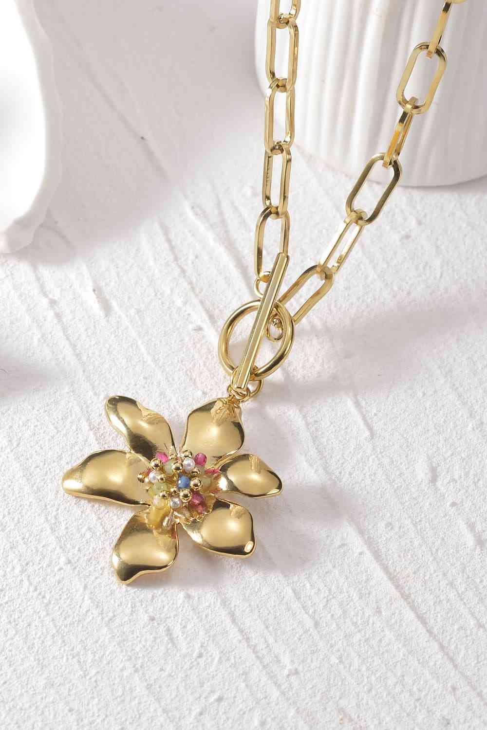 Collier en acier inoxydable avec pendentif fleur