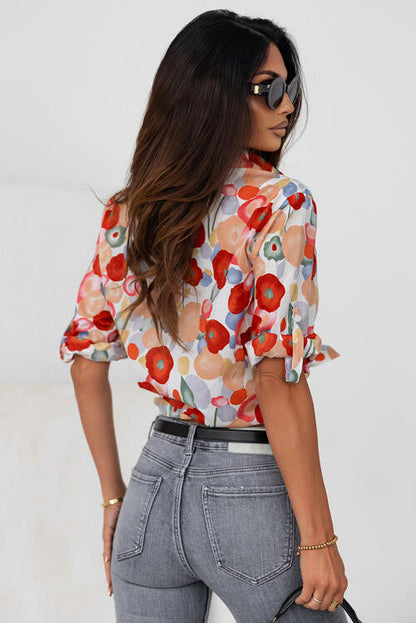 Camisa con botones y cuello con cuello floral