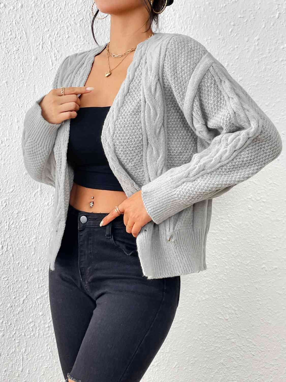 Cardigan ouvert sur le devant en tricot torsadé