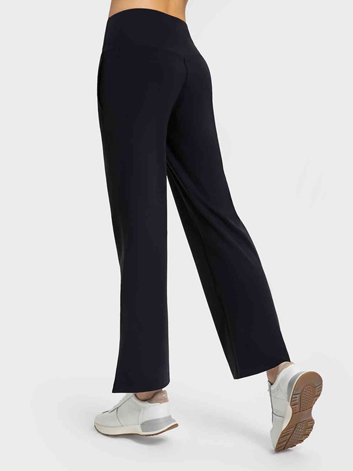 Pantalon de sport fendu à jambe large avec poches