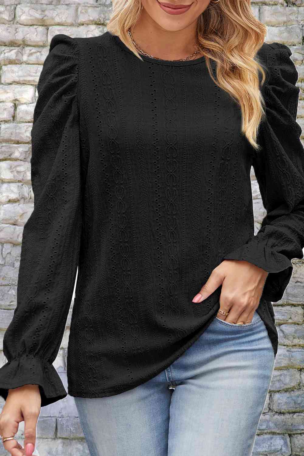 Blouse à manches bouffantes et col rond