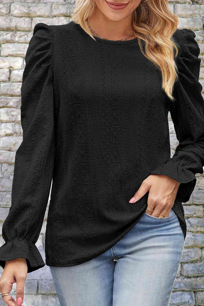 Blusa con cuello redondo y manga abullonada