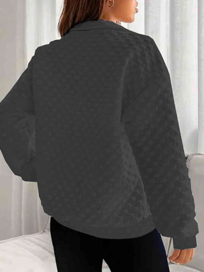 Sudadera con cuello y media cremallera