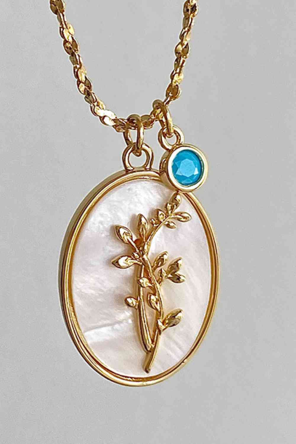 Collier en cuivre avec pendentif en forme de coquille de fleur