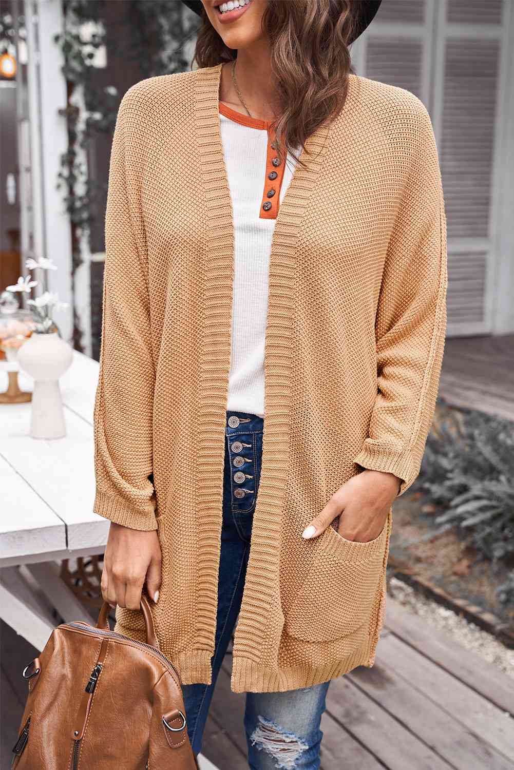 Cardigan long ouvert sur le devant avec poches et coutures apparentes