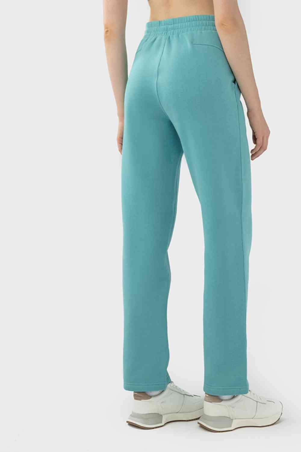 Pantalon de sport à taille avec cordon de serrage et poches