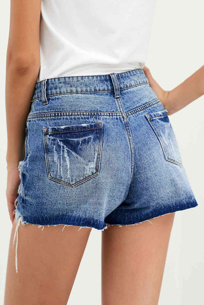 Short en jean effet vieilli avec braguette boutonnée