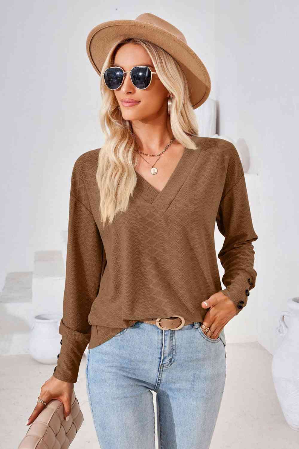 Blusa de manga larga con cuello en V