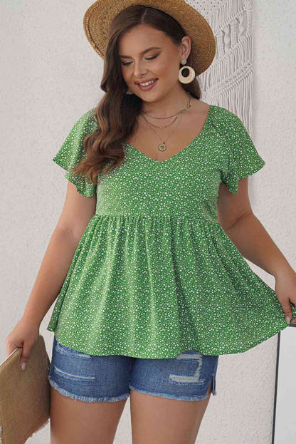 Blusa peplum con mangas acampanadas y estampado floral de florecitas