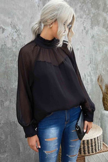 Blouse en maille épissé à col volanté