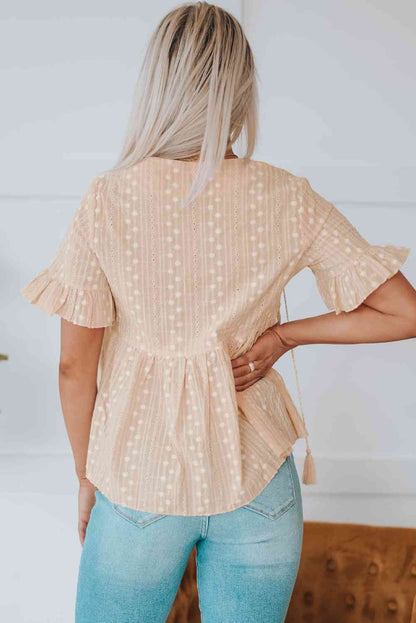 Blusa babydoll con mangas con volantes y borlas bordadas