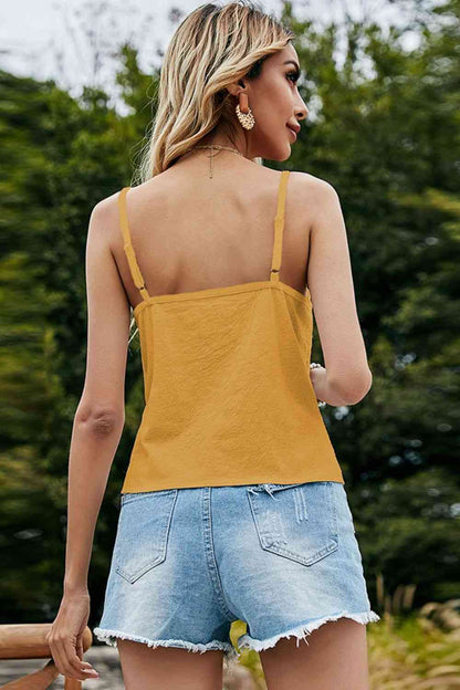 Camisole boutonnée à col en V et bretelles spaghetti