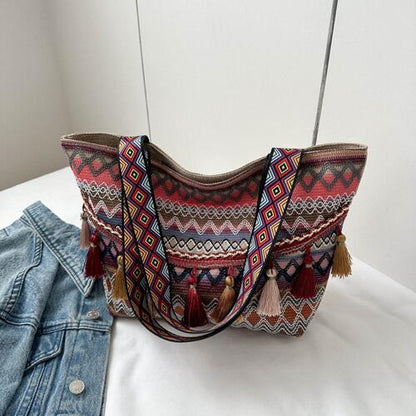 Bolso tote estampado con detalle de borlas