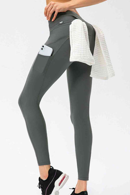 Pantalon de sport long taille haute coupe slim avec poches