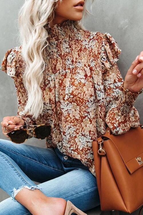 Blusa con volantes y mangas farol fruncidas con estampado floral