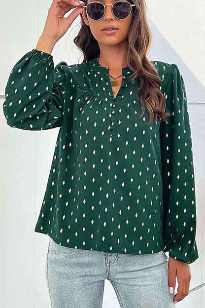 Blusa estampada con mangas abullonadas y botones