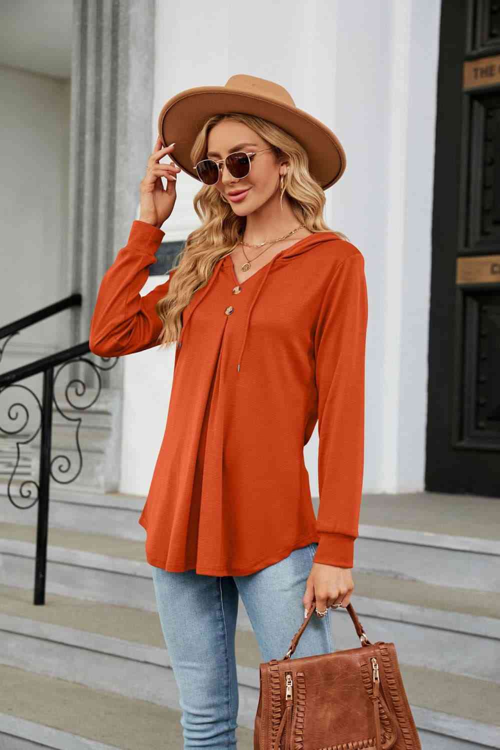 Blusa con capucha de manga larga