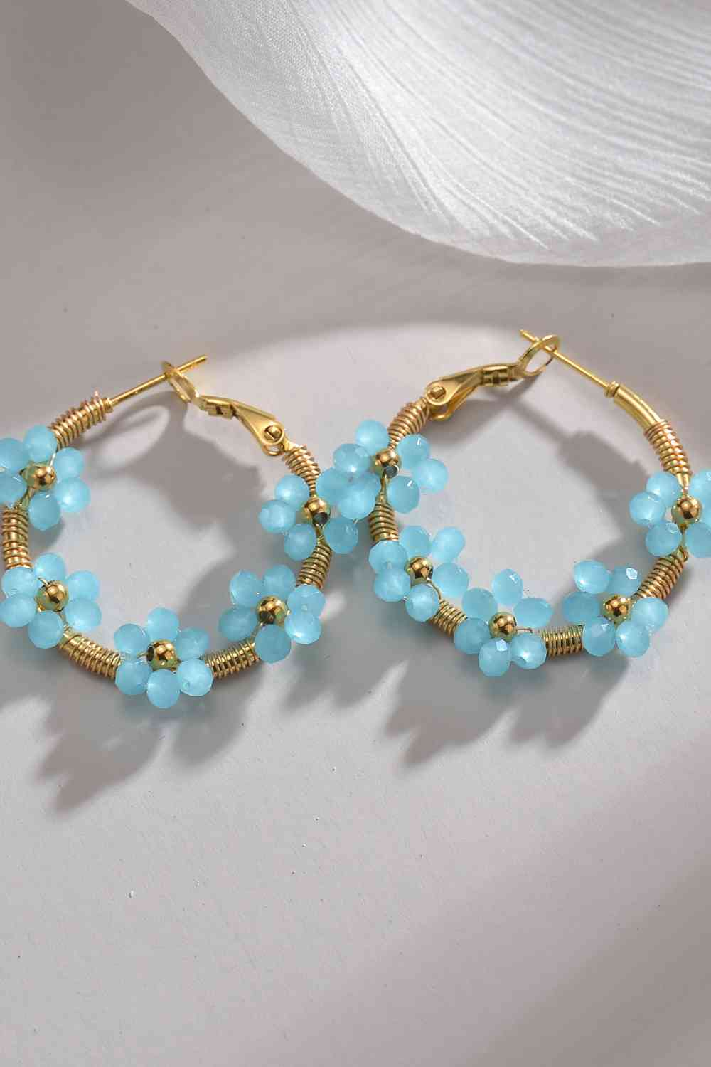 Pendientes de acero inoxidable con flores