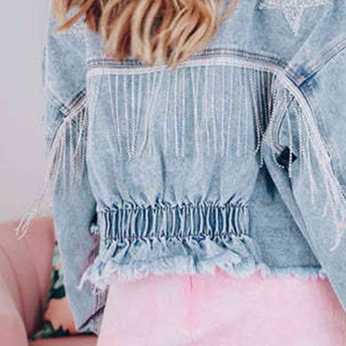 Veste en jean avec ourlet brut et franges