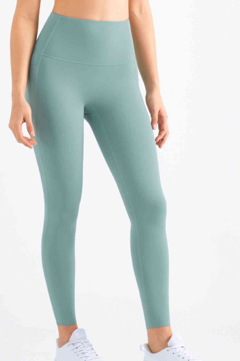 Leggings de yoga con bolsillo y pretina elástica altamente elásticos