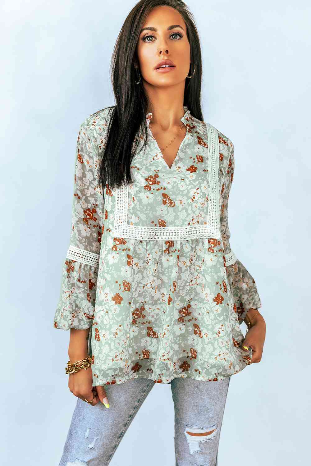 Blusa con ribete de encaje floral