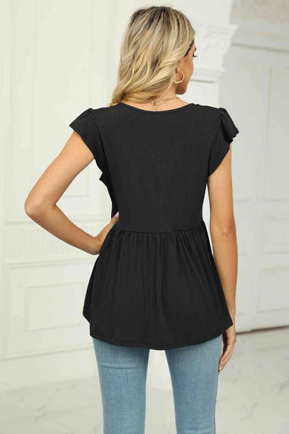 Blusa babydoll con mangas acampanadas y cuello en V