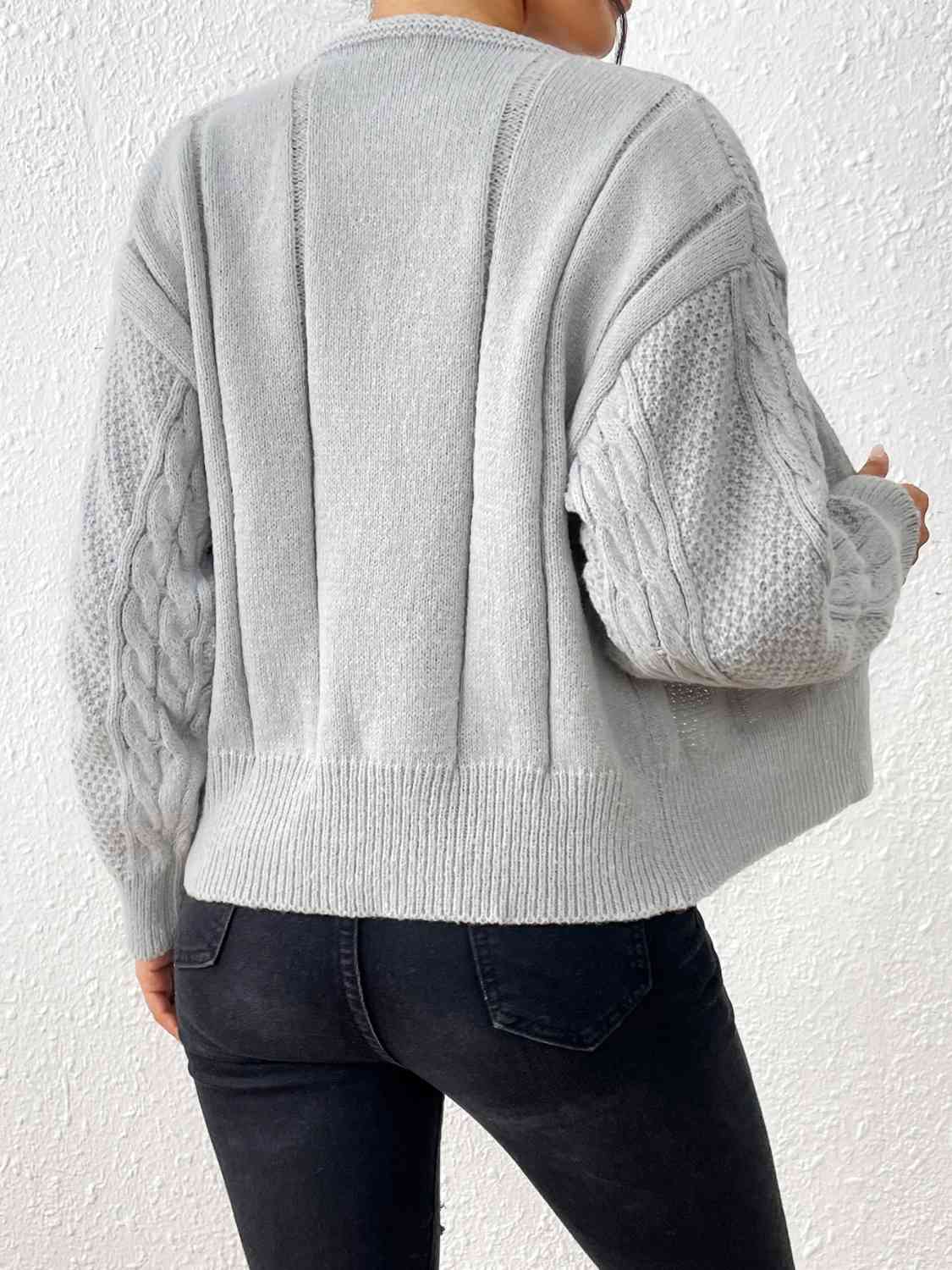 Cardigan ouvert sur le devant en tricot torsadé