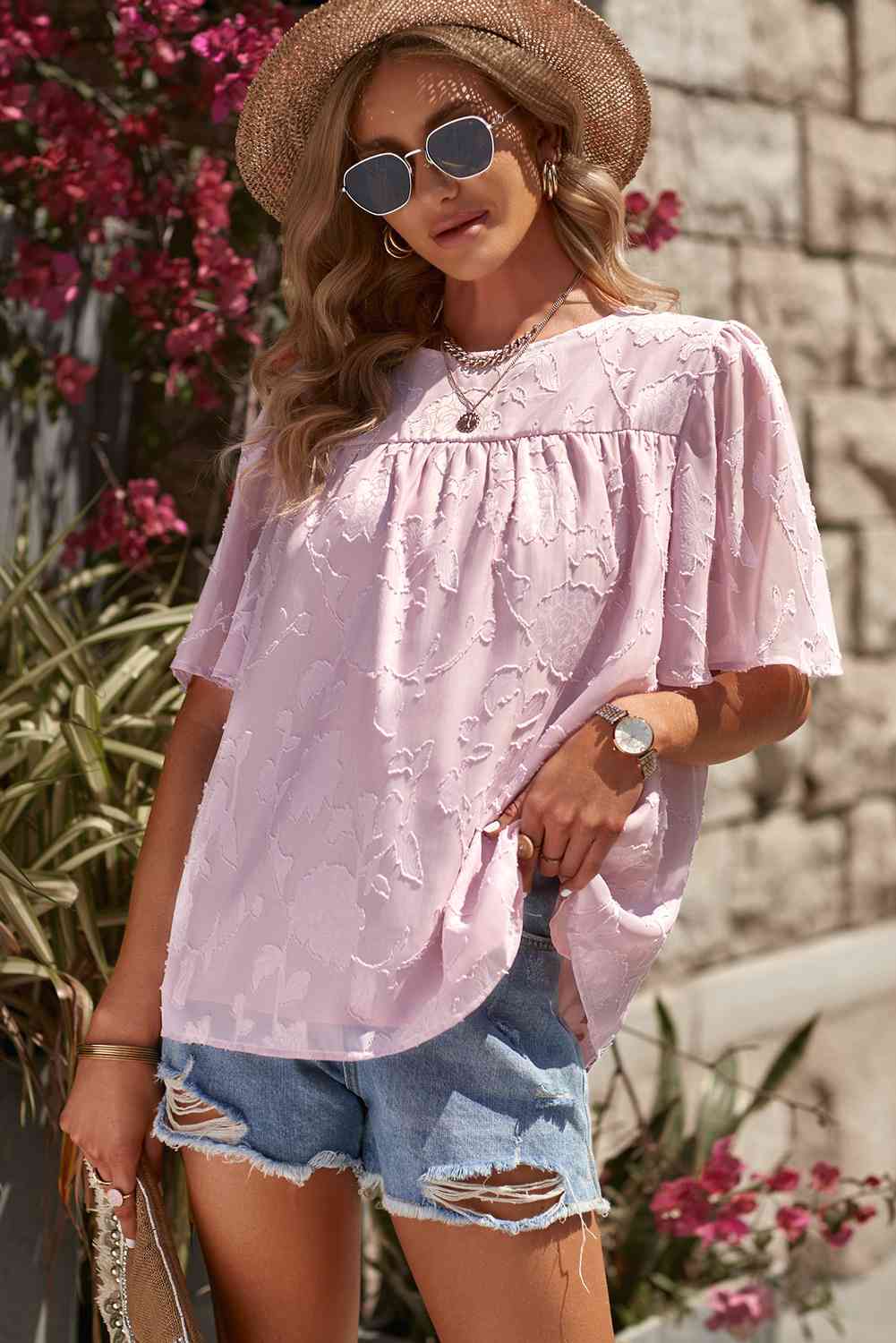 Blusa con cuello redondo y manga abullonada