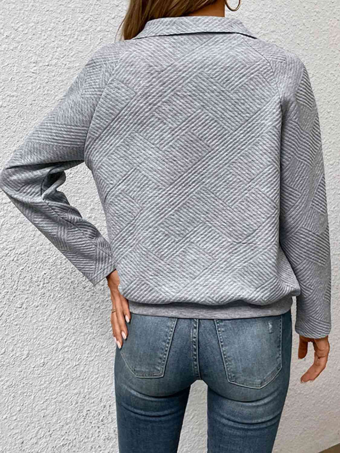 Sweat-shirt à col semi-boutonné avec poche