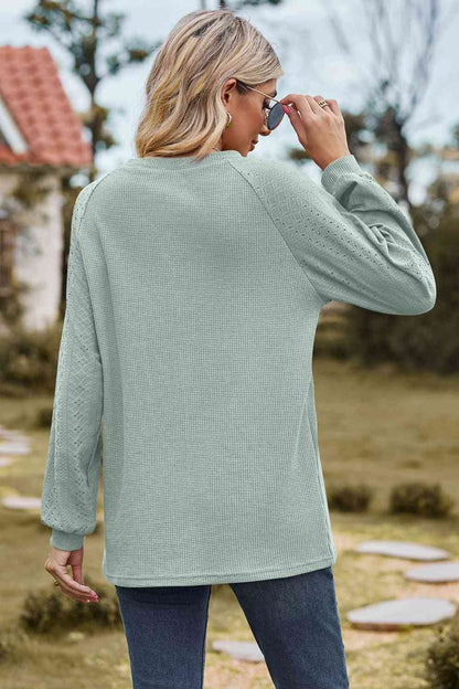 Sudadera con cuello redondo y manga raglán