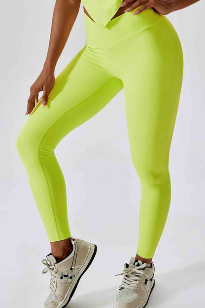 Legging de sport coupe slim avec large ceinture et poche arrière