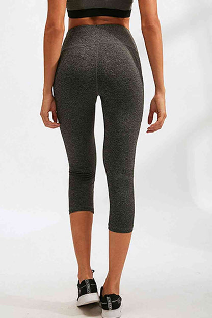 Legging actif coupe slim à large taille et poches