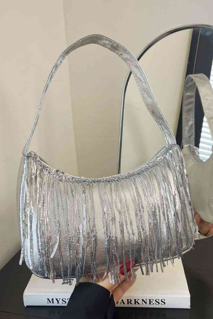 Bolso con detalle de flecos