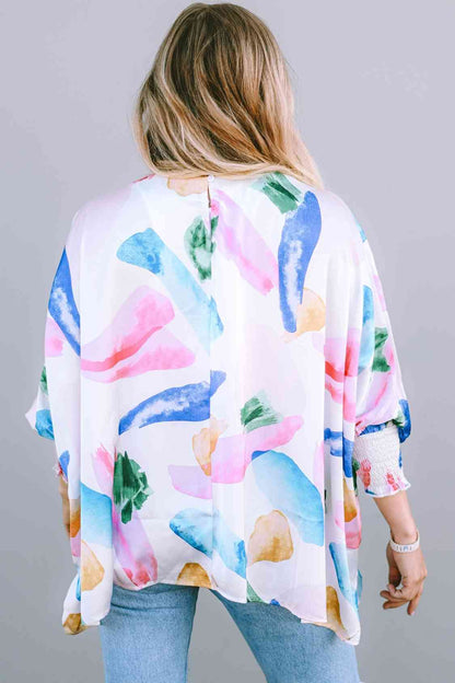 Blusa estampada con cuello redondo y manga farol ahumada