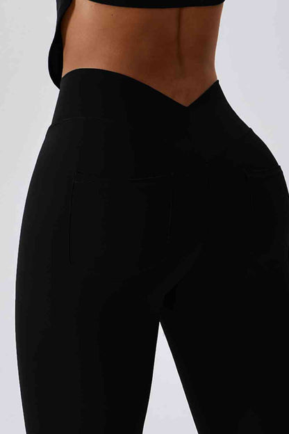 Legging de sport coupe slim avec large ceinture et poche arrière