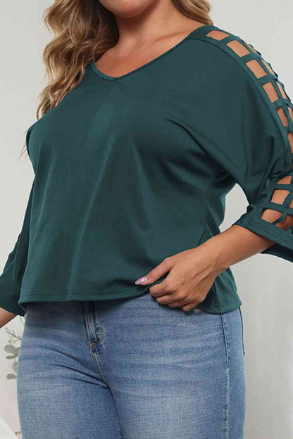 Blusa de manga tres cuartos con abertura de talla grande