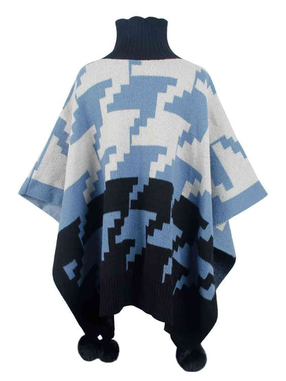 Poncho à col roulé et bordure à pompons