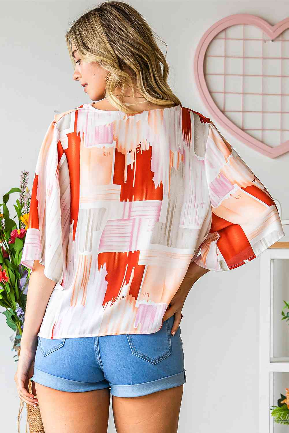 Blouse imprimée à col bénitier et manches mi-longues