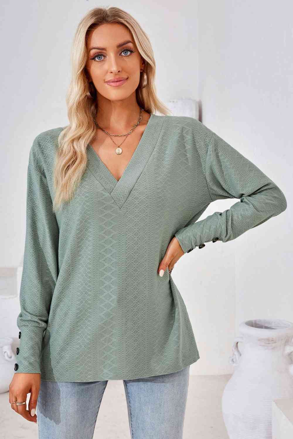 Blusa de manga larga con cuello en V