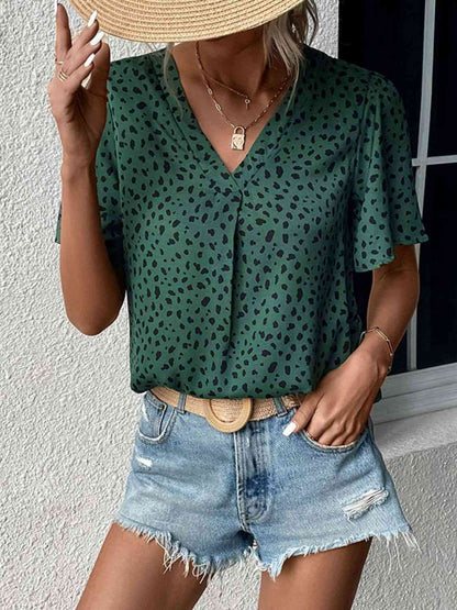 Blusa con mangas acampanadas y cuello en V con estampado animal