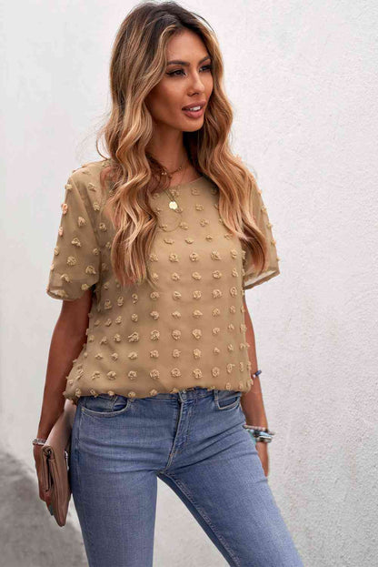 Blusa con cuello redondo y lunares suizos