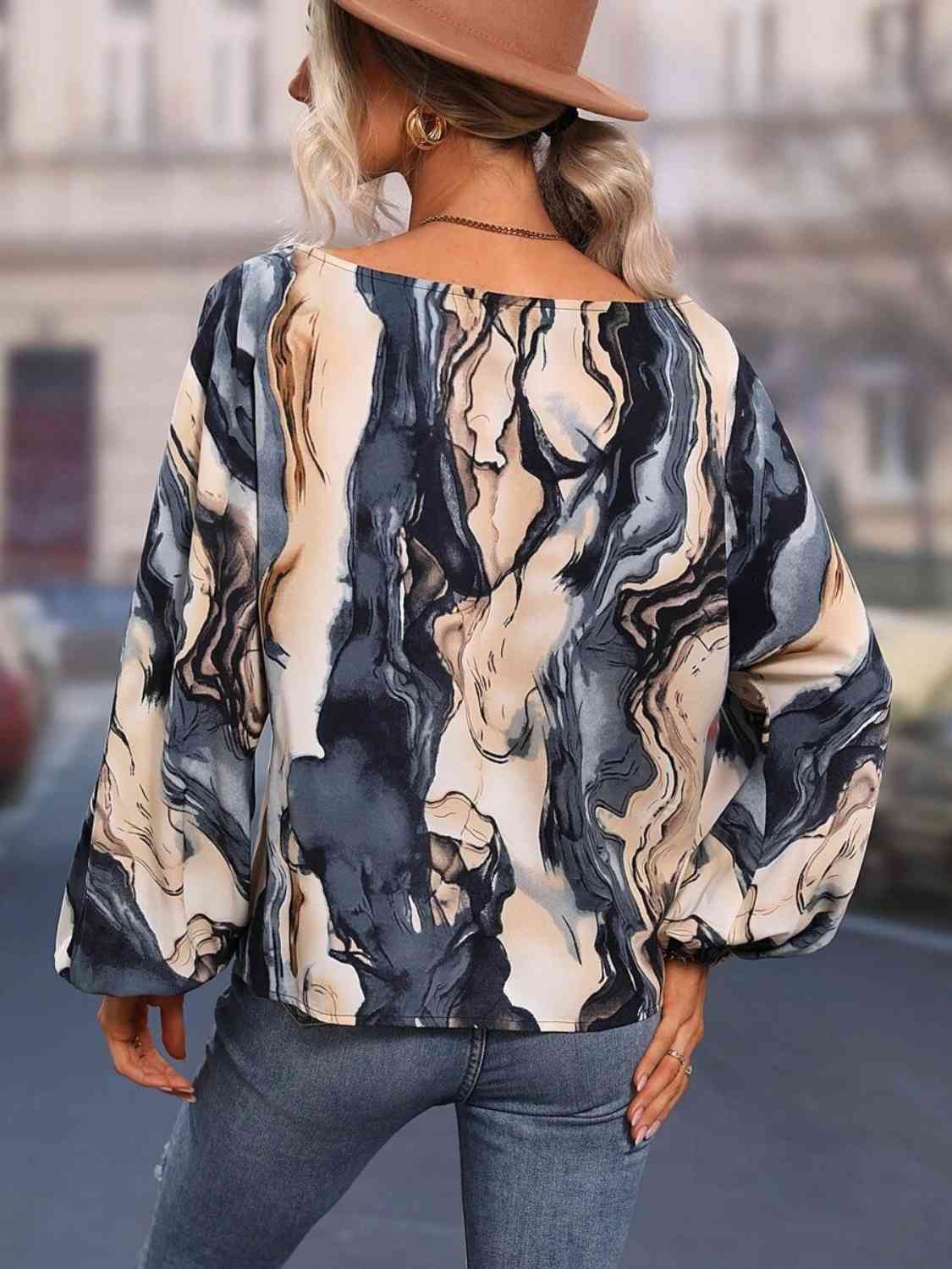 Blusa estampada con cuello barco