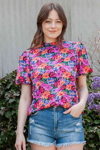 Blusa con cuello redondo y manga abullonada con estampado floral