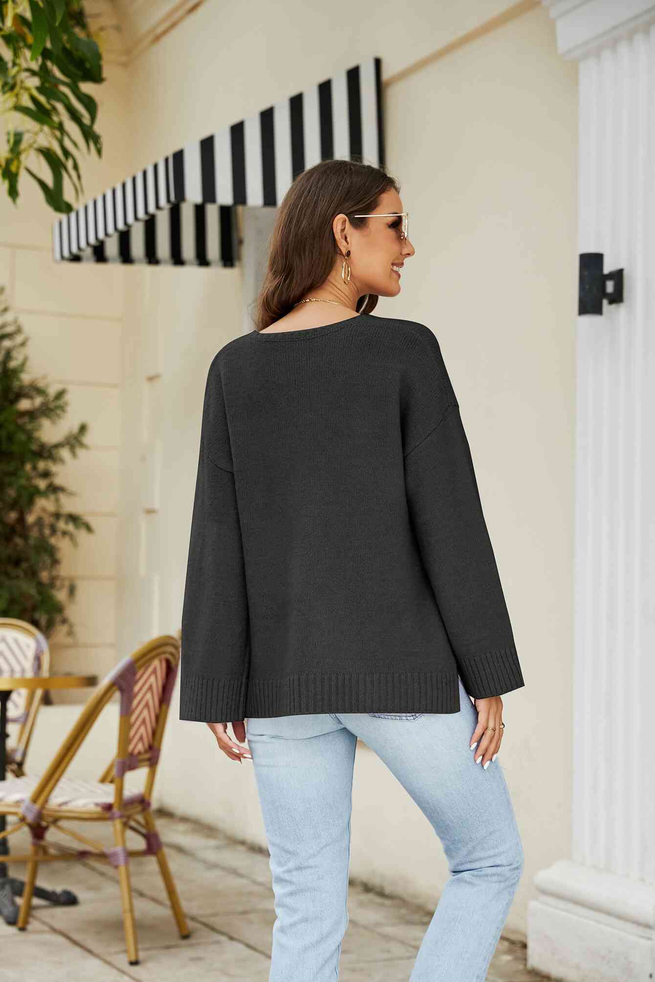 Pull en tricot à col en V et épaules tombantes