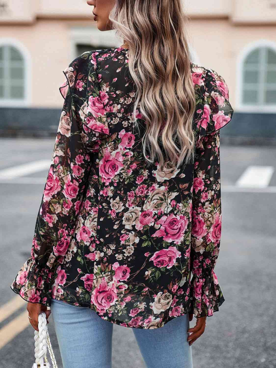 Blouse smockée à col rond et manches volantées