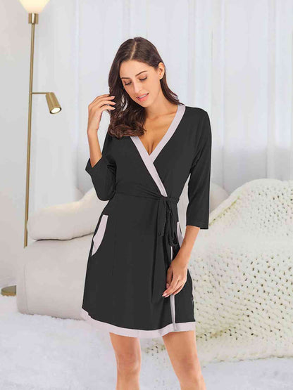 Robe à col surplis et poches à nouer à la taille