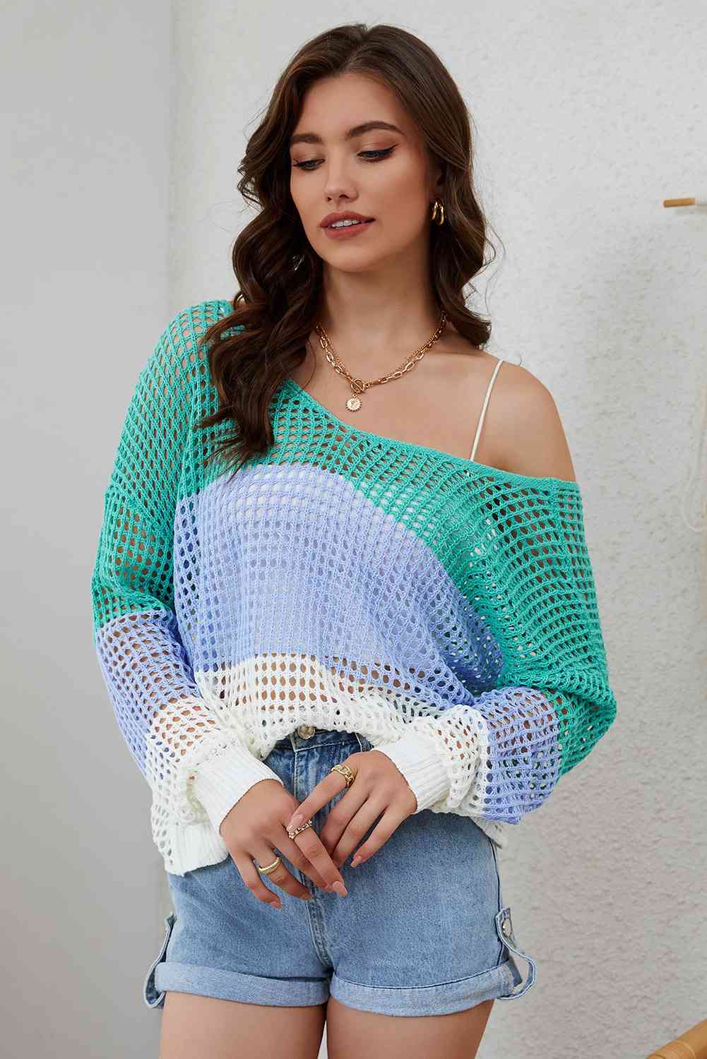 Blusa calada con cuello en V y hombros caídos