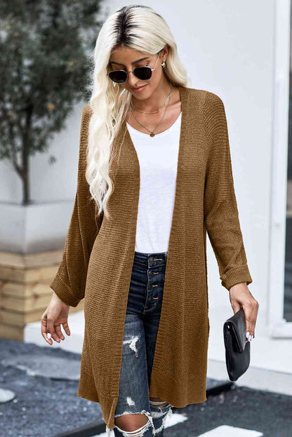 Cardigan long en tricot ouvert sur le devant avec fente latérale