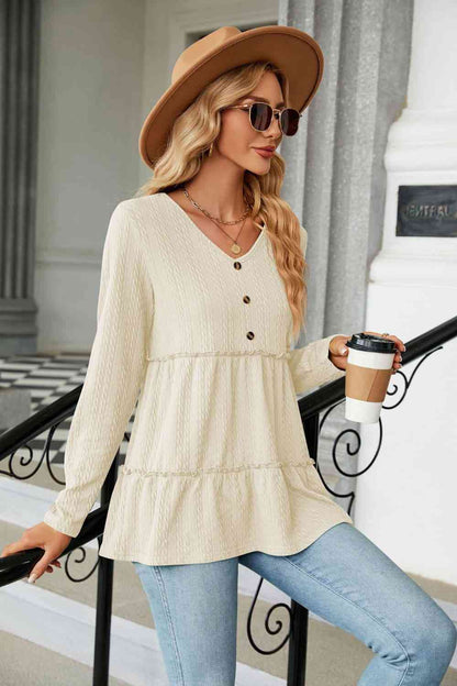 Blouse en tricot torsadé à manches longues et col en V